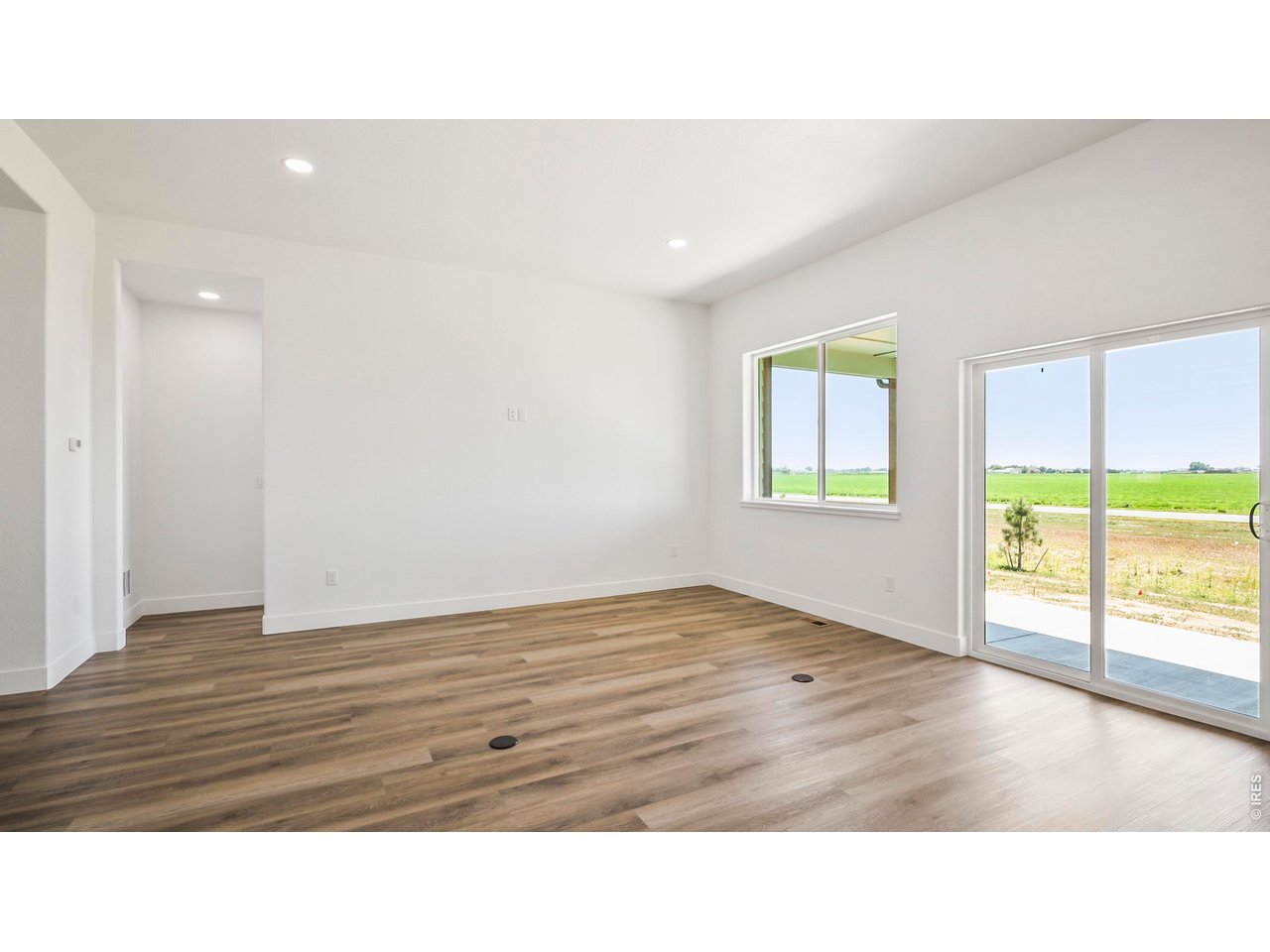448 Cache Avenue Fort Morgan, CO 80701 - Photo 5 of 43 a room with a bed and a window