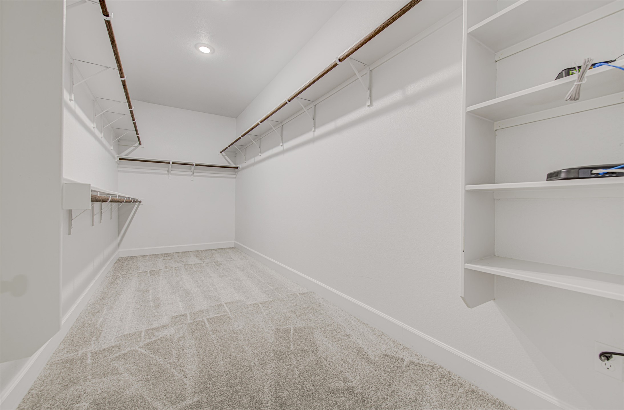 316 Buffalo Ridge Drive Manchaca, TX 78652 - Photo 16 of 37 a view of a room with racks on the wall