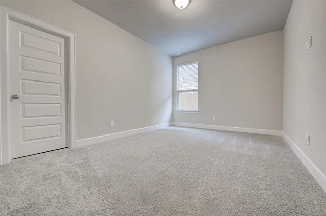 a view of empty room with a window