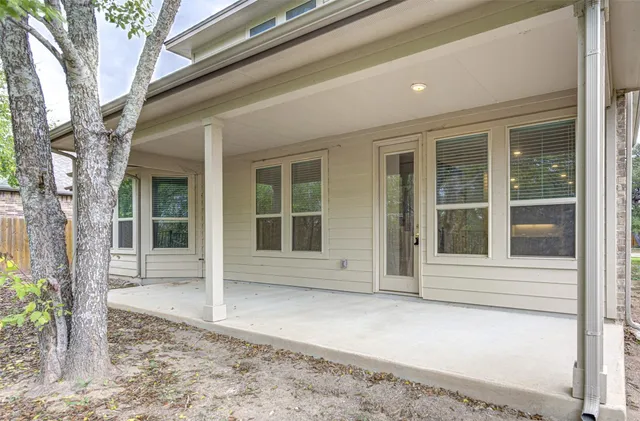 front view of a house with a small yard