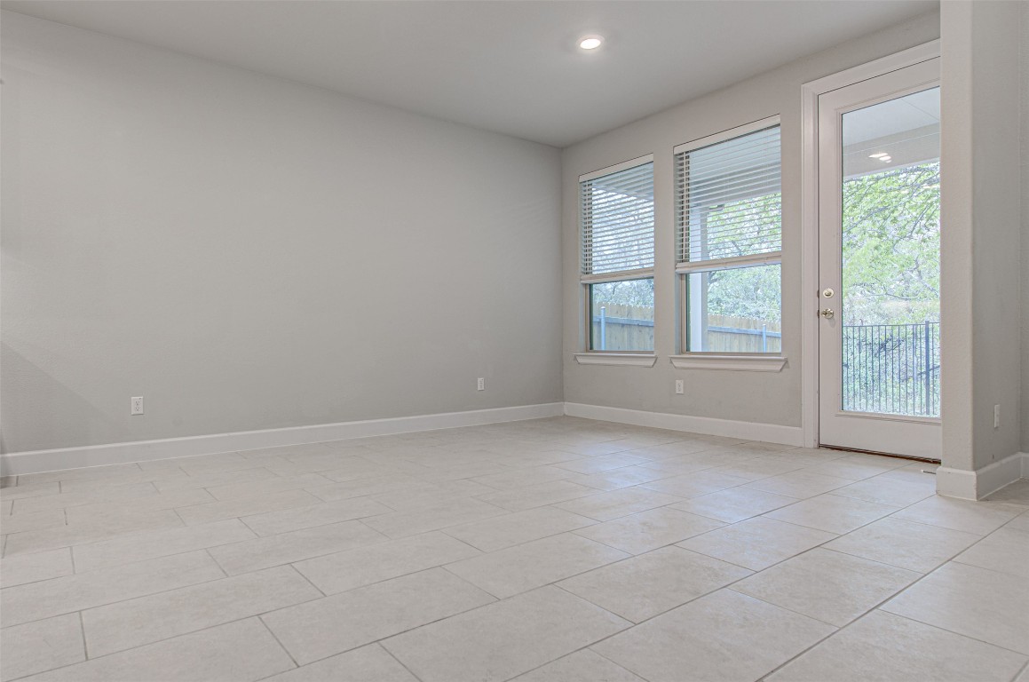 316 Buffalo Ridge Drive Manchaca, TX 78652 - Photo 9 of 37 an empty room with windows