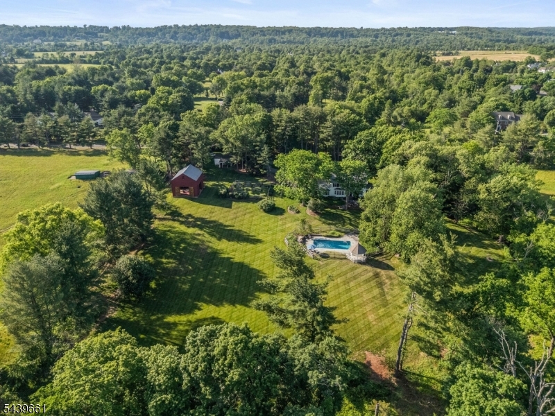 29 Bedens Brook Road Skillman, NJ 08558 - Photo 50 of 50 an aerial view of residential houses with outdoor space and trees