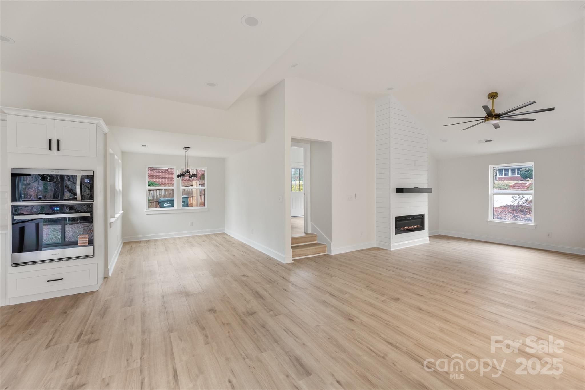 3021 Whitson Road Gastonia, NC 28054 - Photo 15 of 31 wooden floor in an empty room with a window