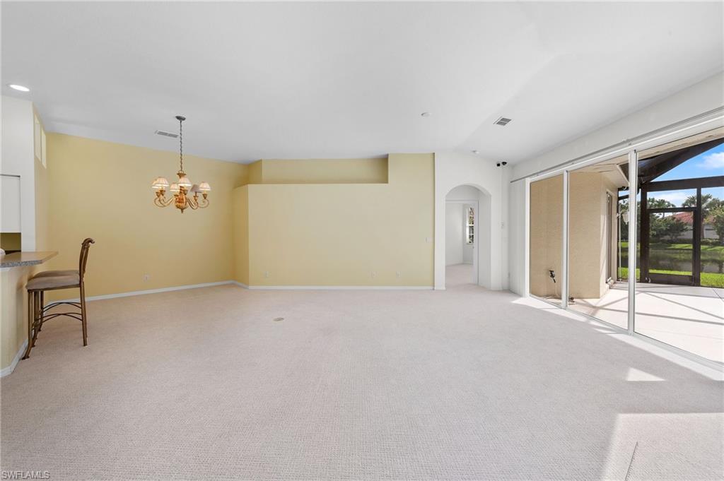 23851 Amalfi Coast Road Estero, FL 34135 - Photo 17 of 49 a view of a livingroom with a bench