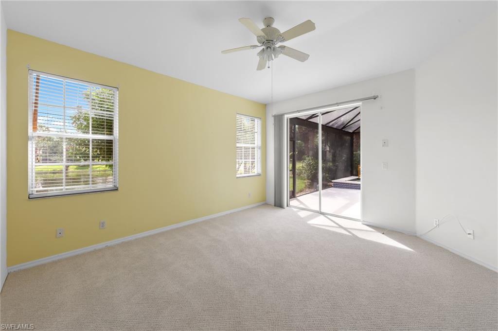 23851 Amalfi Coast Road Estero, FL 34135 - Photo 22 of 49 a view of an empty room with a window