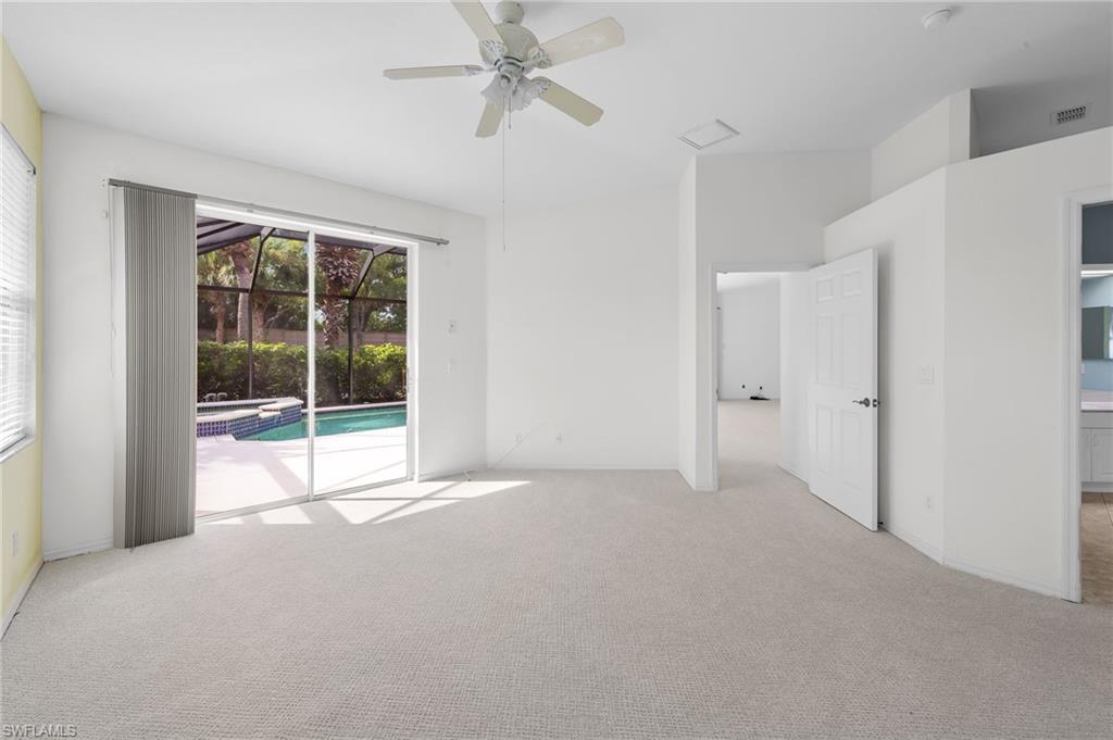 23851 Amalfi Coast Road Estero, FL 34135 - Photo 23 of 49 a view of an empty room with a window