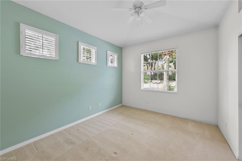 23851 Amalfi Coast Road Estero, FL 34135 - Photo 29 of 49 an empty room with a window