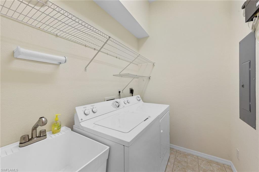 23851 Amalfi Coast Road Estero, FL 34135 - Photo 31 of 49 a utility room with dryer and washer