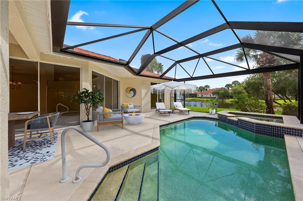 23851 Amalfi Coast Road Estero, FL 34135 - Photo 4 of 49 a view of swimming pool with outdoor seating