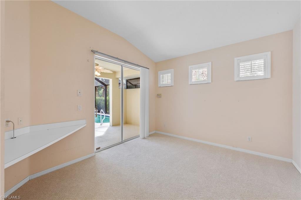23851 Amalfi Coast Road Estero, FL 34135 - Photo 8 of 49 a view of an empty room with window