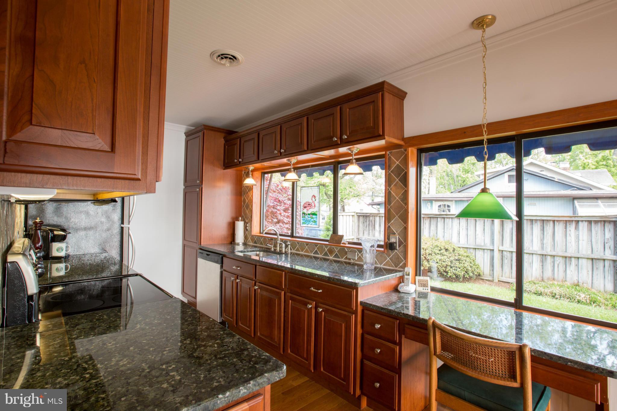100 Ridge Road Riva, MD 21140 - Photo 17 of 29 a large kitchen with kitchen island a large window in it