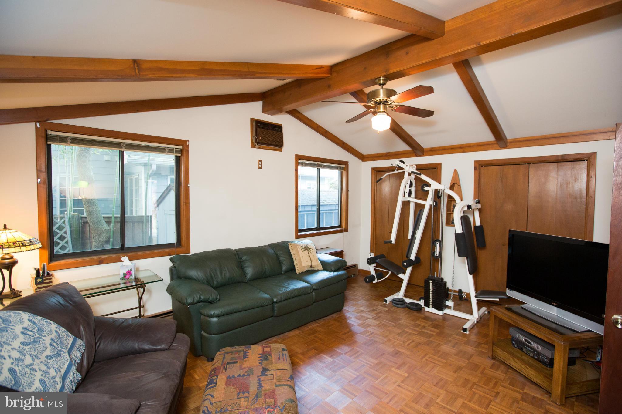 100 Ridge Road Riva, MD 21140 - Photo 20 of 29 a living room with furniture a flat screen tv and a window
