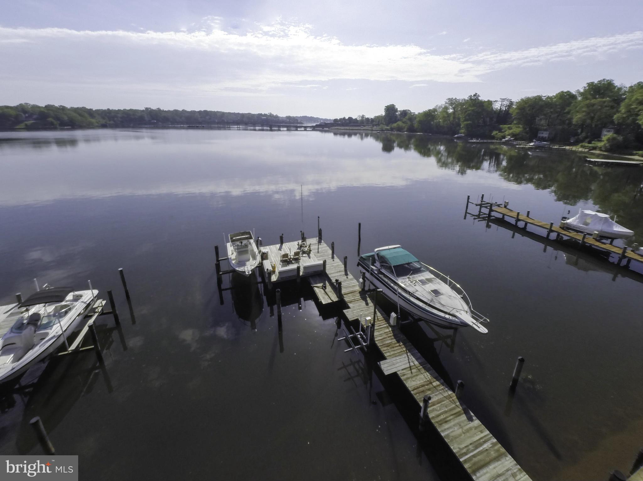 100 Ridge Road Riva, MD 21140 - Photo 4 of 29 a view of a lake with outdoor seating