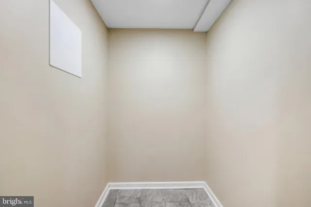 a view of small space with closet