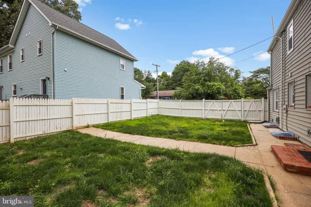 a view of backyard with green space