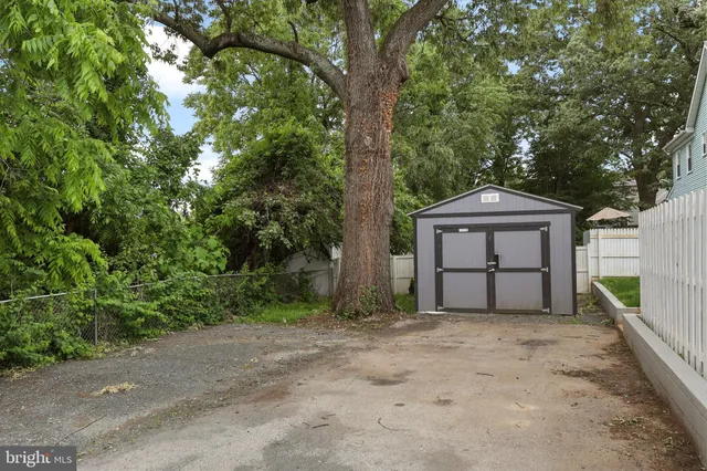 a house with trees in front of it