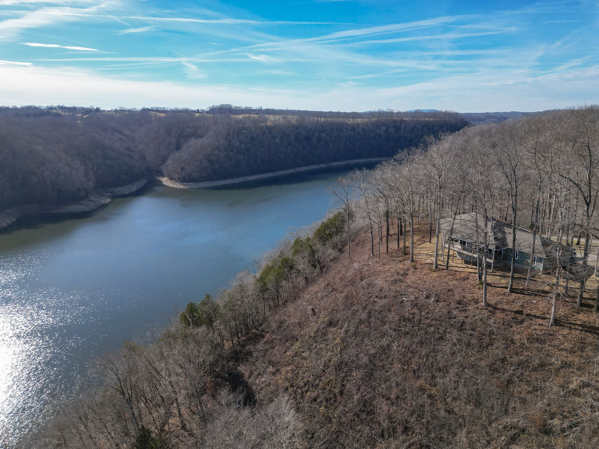 1290 Stillhouse Branch Road Sparta, TN 38583 - Photo 2 of 51 a view of a dry yard with wooden fence