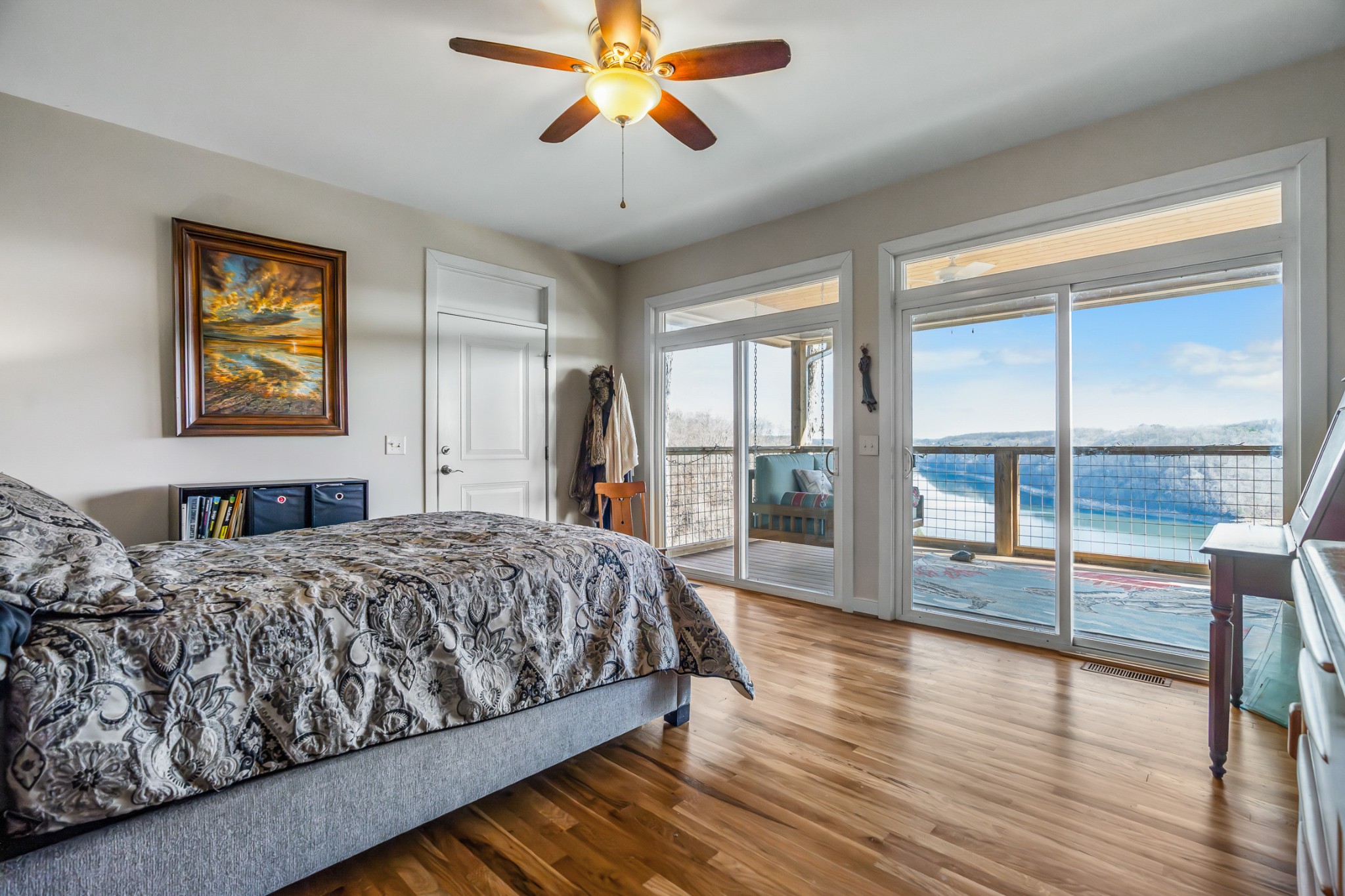 1290 Stillhouse Branch Road Sparta, TN 38583 - Photo 26 of 51 a bedroom with a balcony a bed and wooden floor