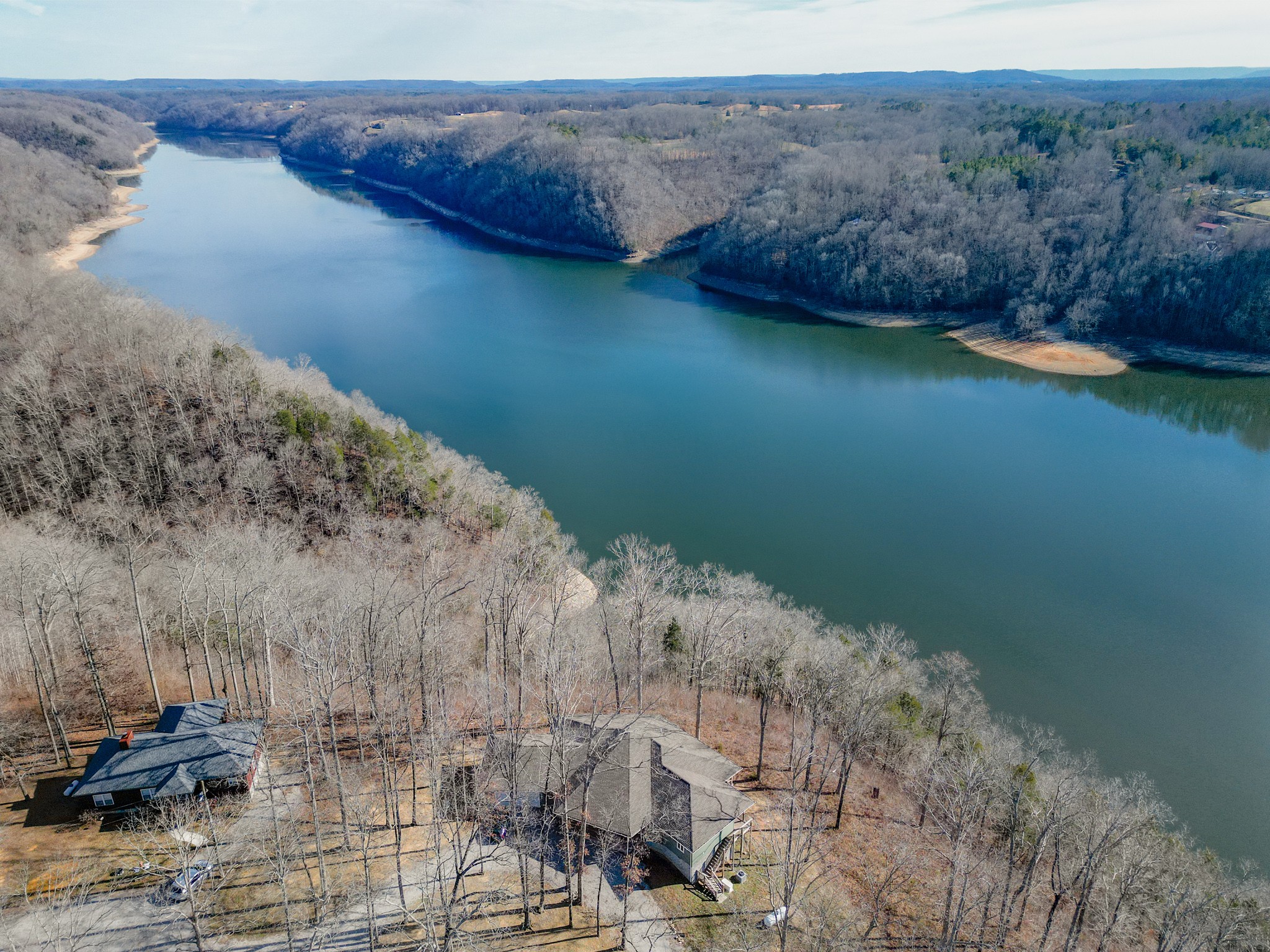 1290 Stillhouse Branch Road Sparta, TN 38583 - Photo 3 of 51 a view of a lake with mountain