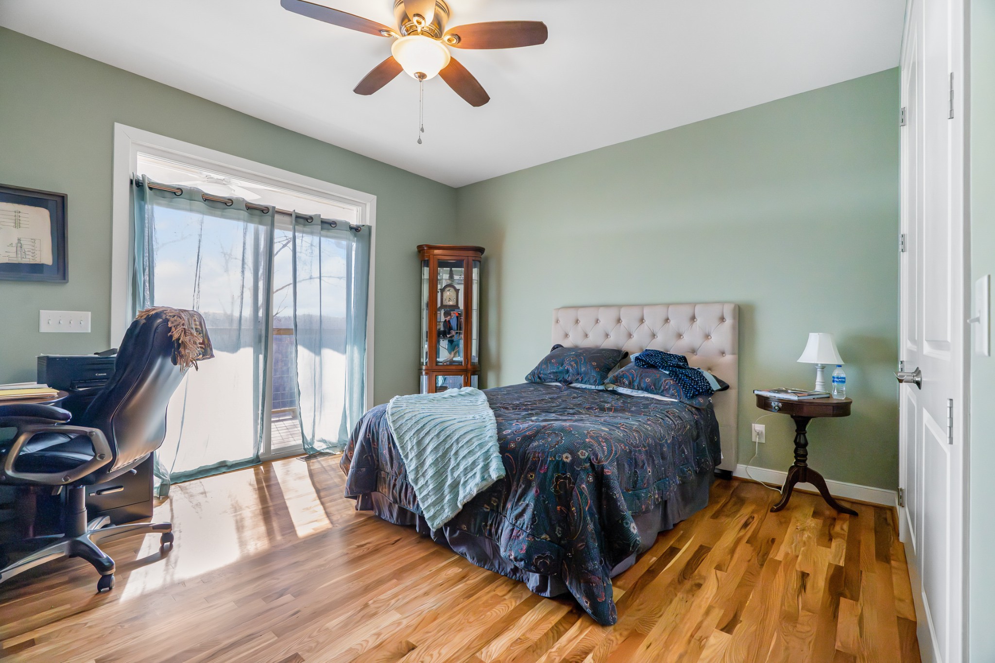 1290 Stillhouse Branch Road Sparta, TN 38583 - Photo 31 of 51 a bedroom with a bed and wooden floor