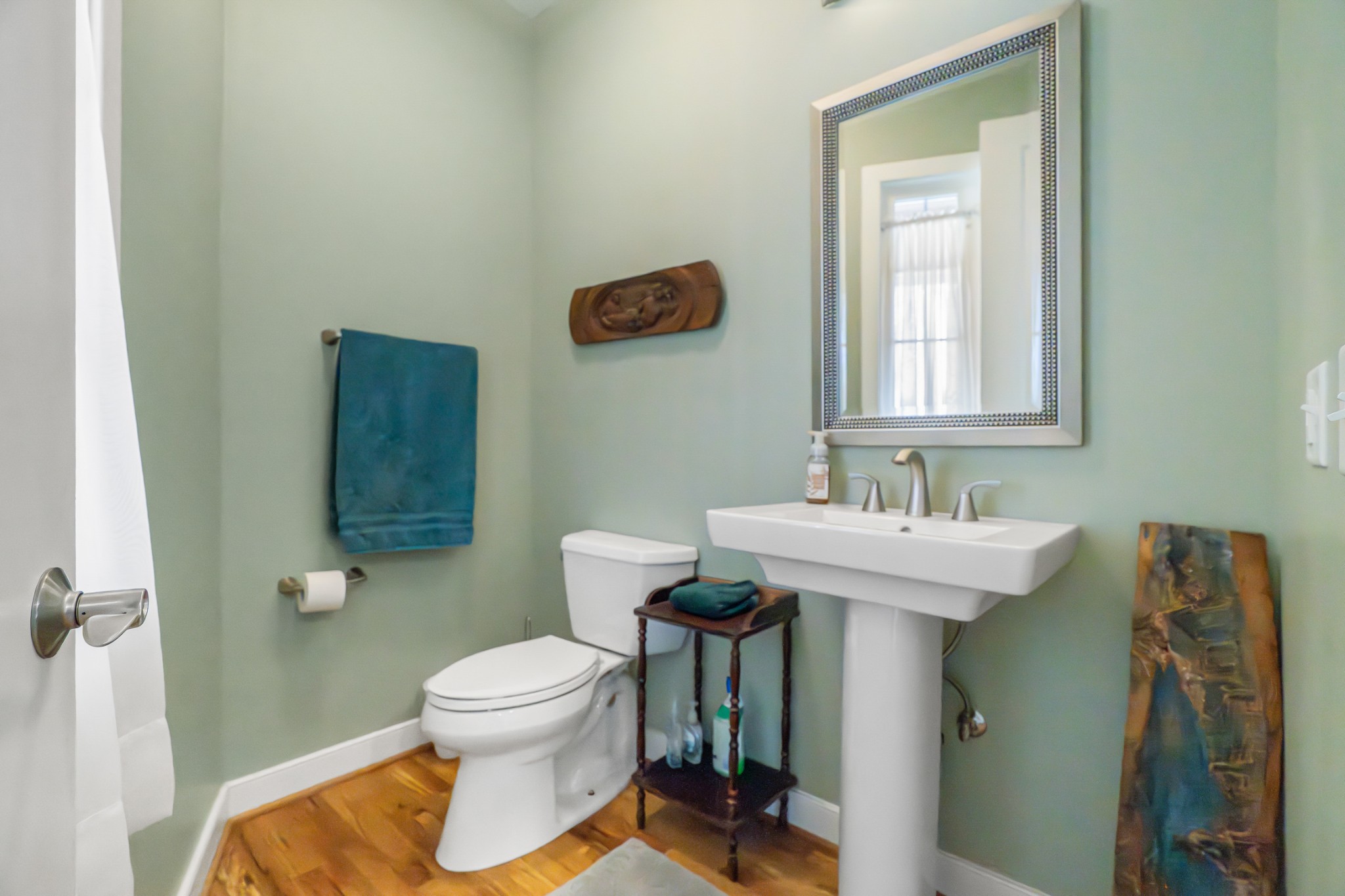 1290 Stillhouse Branch Road Sparta, TN 38583 - Photo 34 of 51 a bathroom with a toilet a sink and mirror