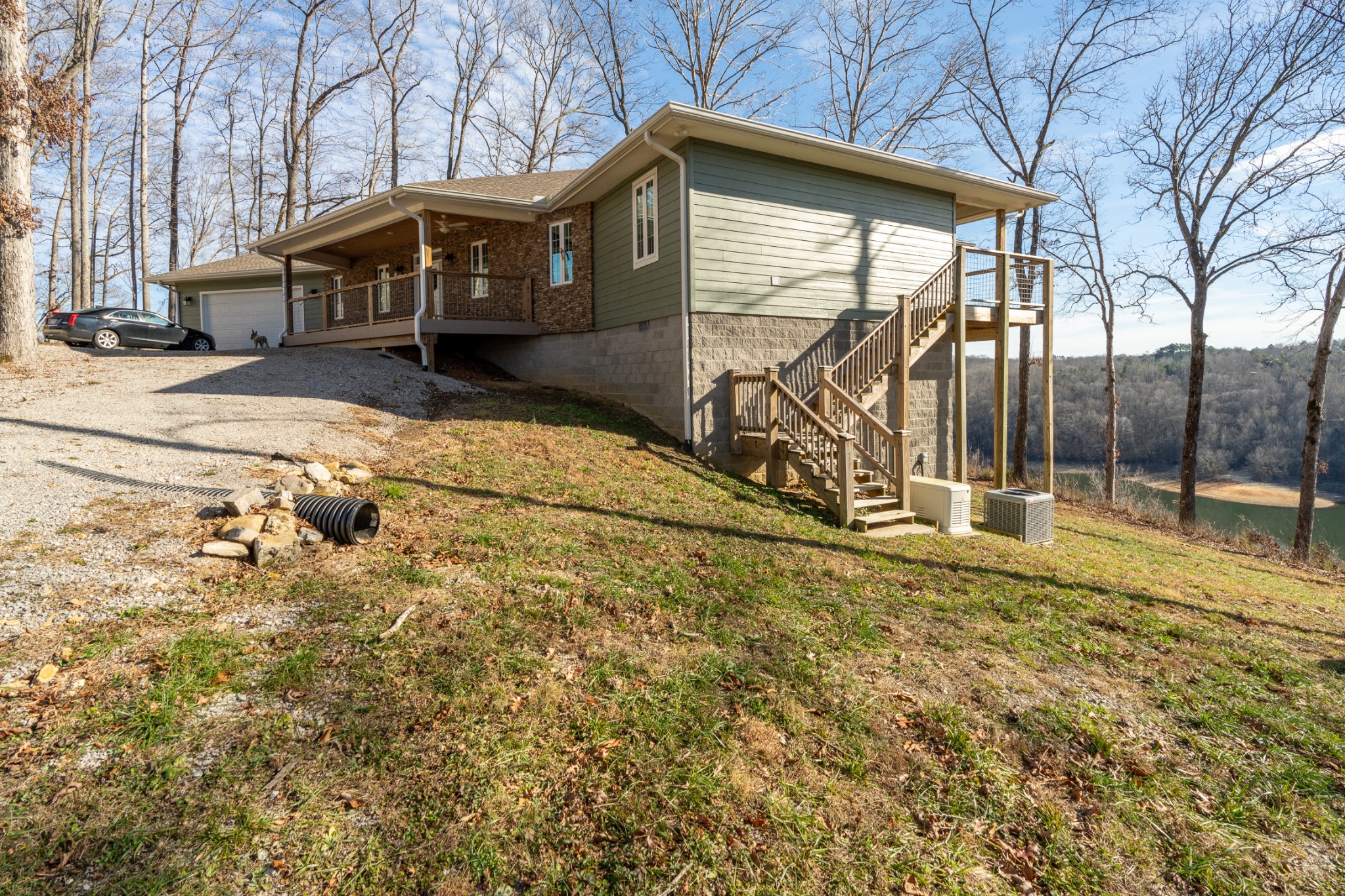 1290 Stillhouse Branch Road Sparta, TN 38583 - Photo 38 of 51 a view of a house with a large tree