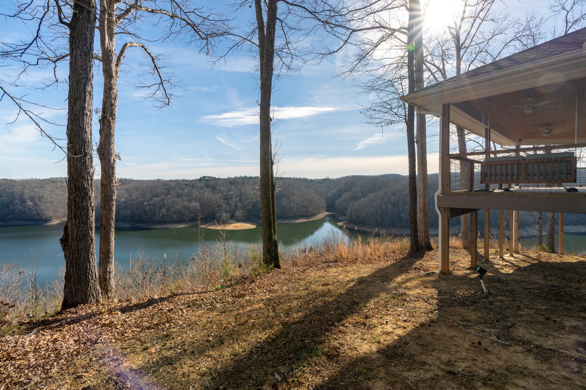 1290 Stillhouse Branch Road Sparta, TN 38583 - Photo 39 of 51 a view of a lake with a yard