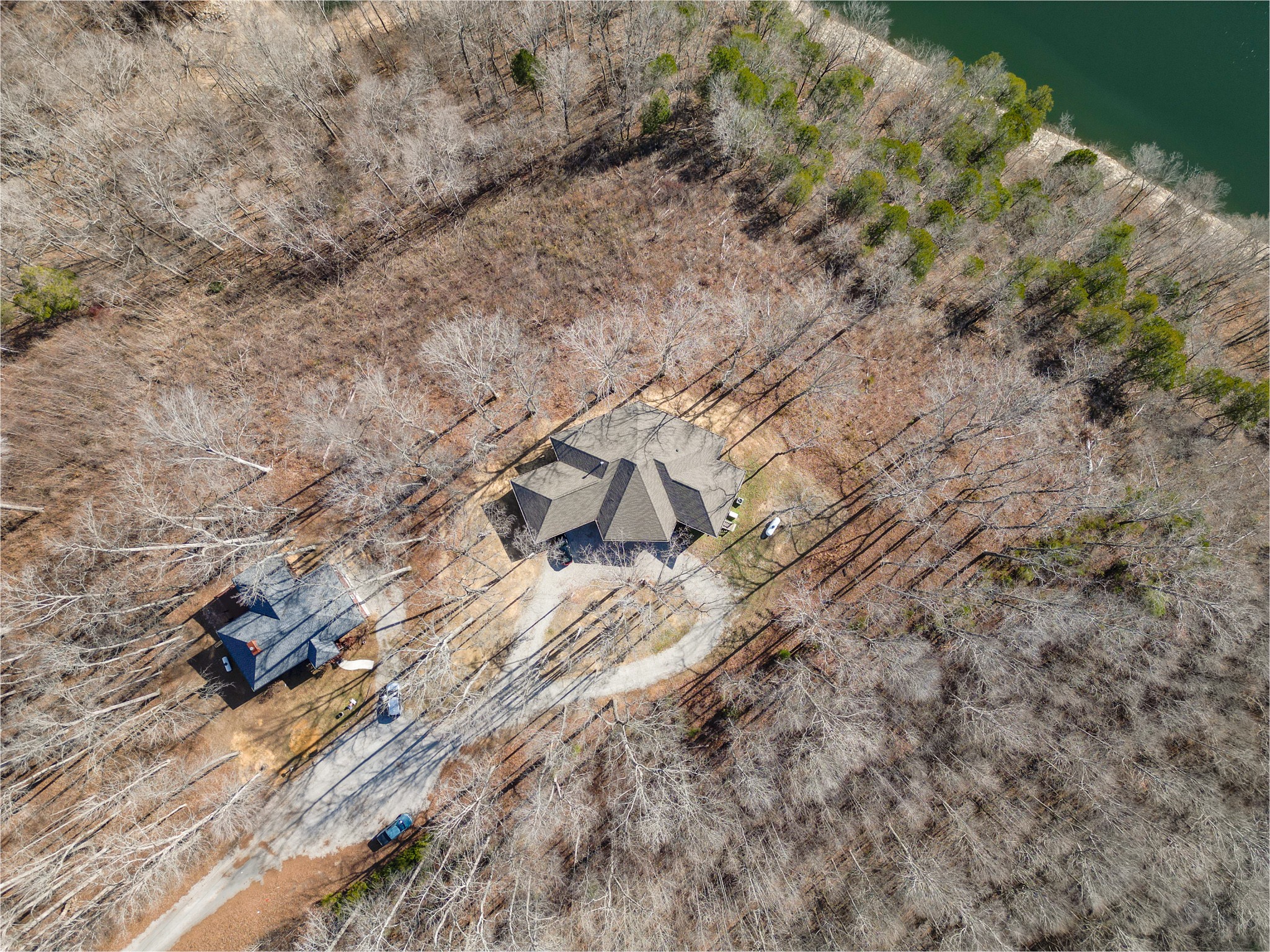 1290 Stillhouse Branch Road Sparta, TN 38583 - Photo 45 of 51 a view of a dry yard with wooden floor and fence