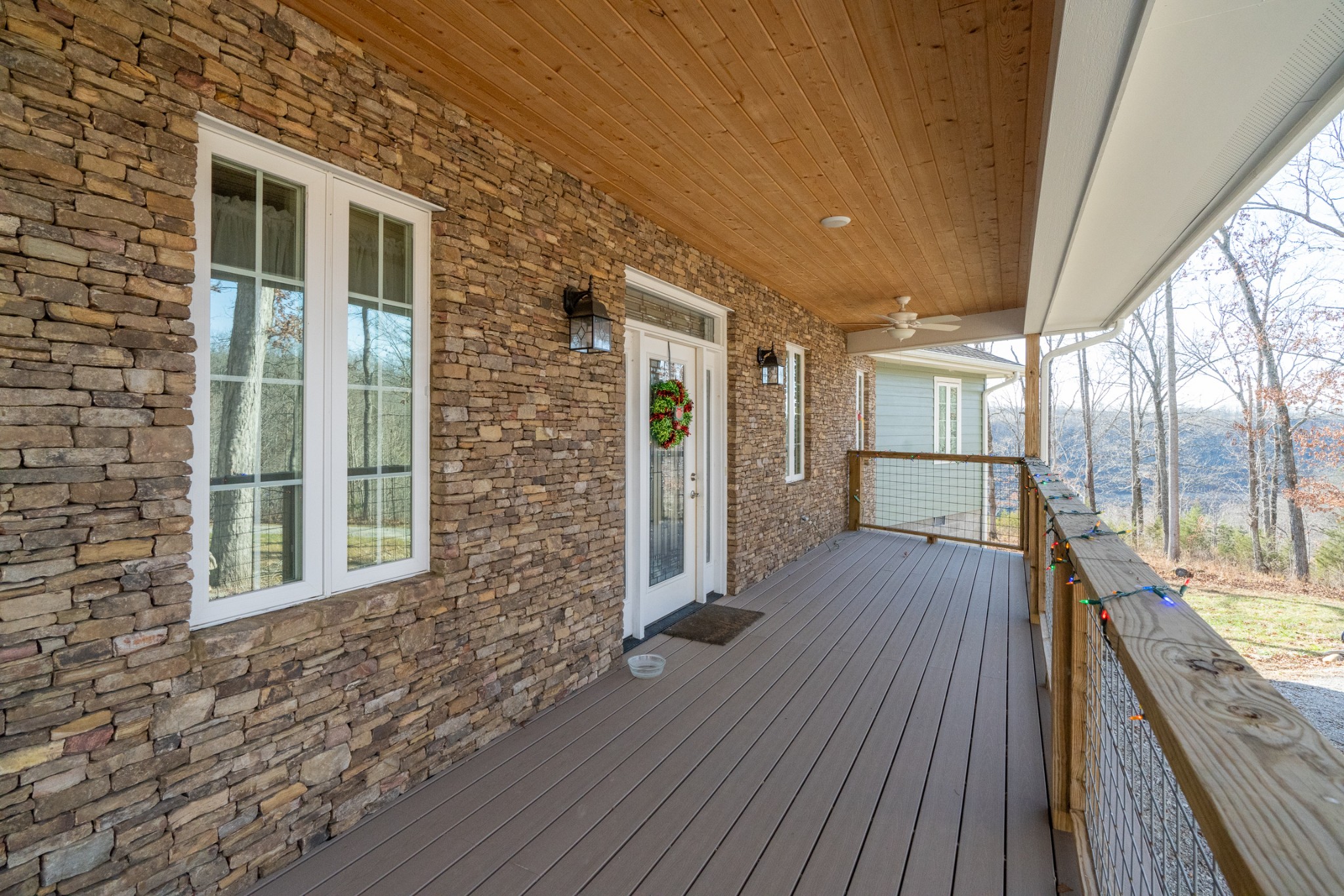 1290 Stillhouse Branch Road Sparta, TN 38583 - Photo 10 of 51 a view of a porch with wooden floor and outdoor space