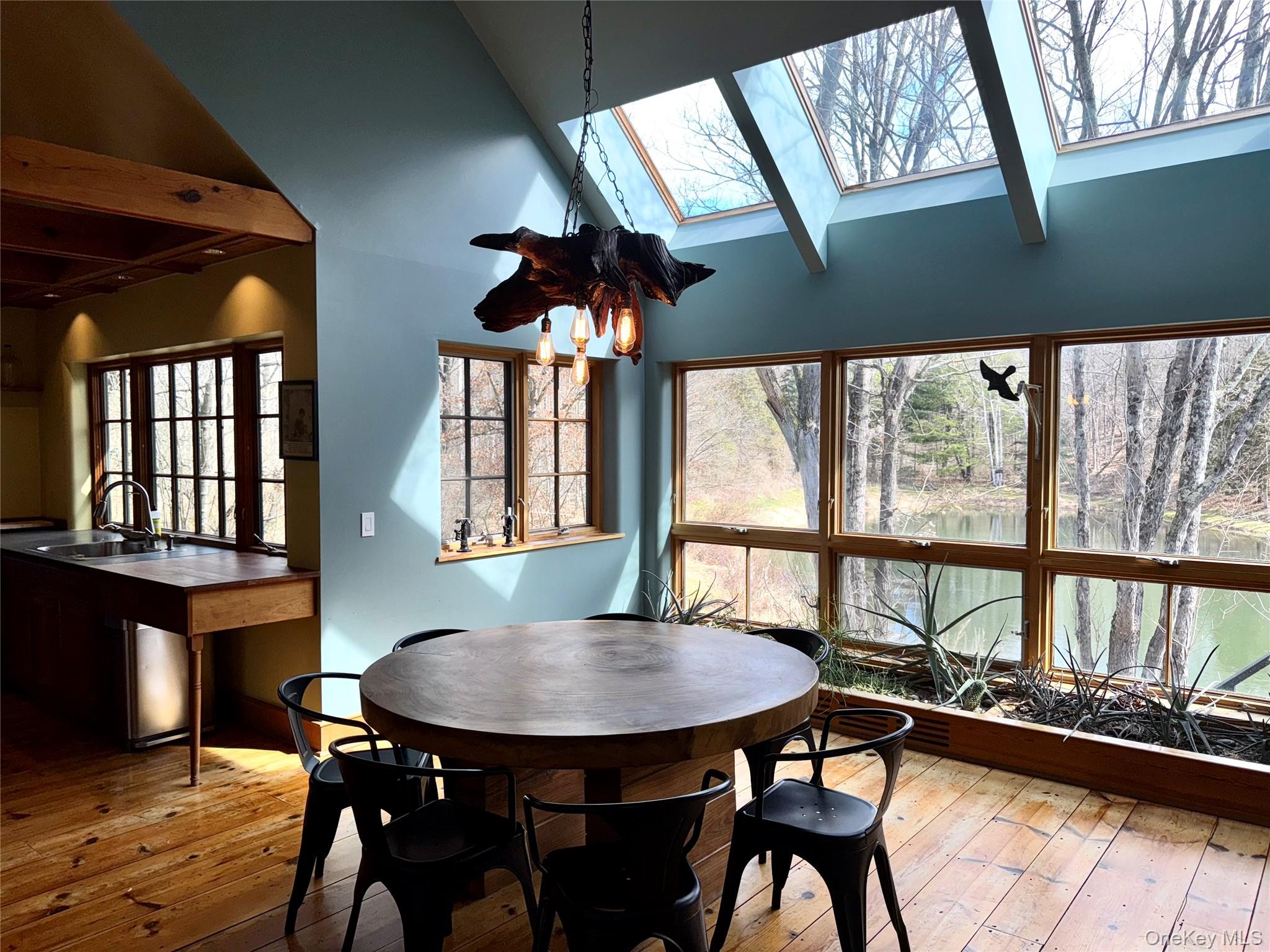 22 Knight Road Clinton Corners, NY 12514 - Photo 17 of 34 Dining room featuring Vaulted Ceiling and Wall of Winddows