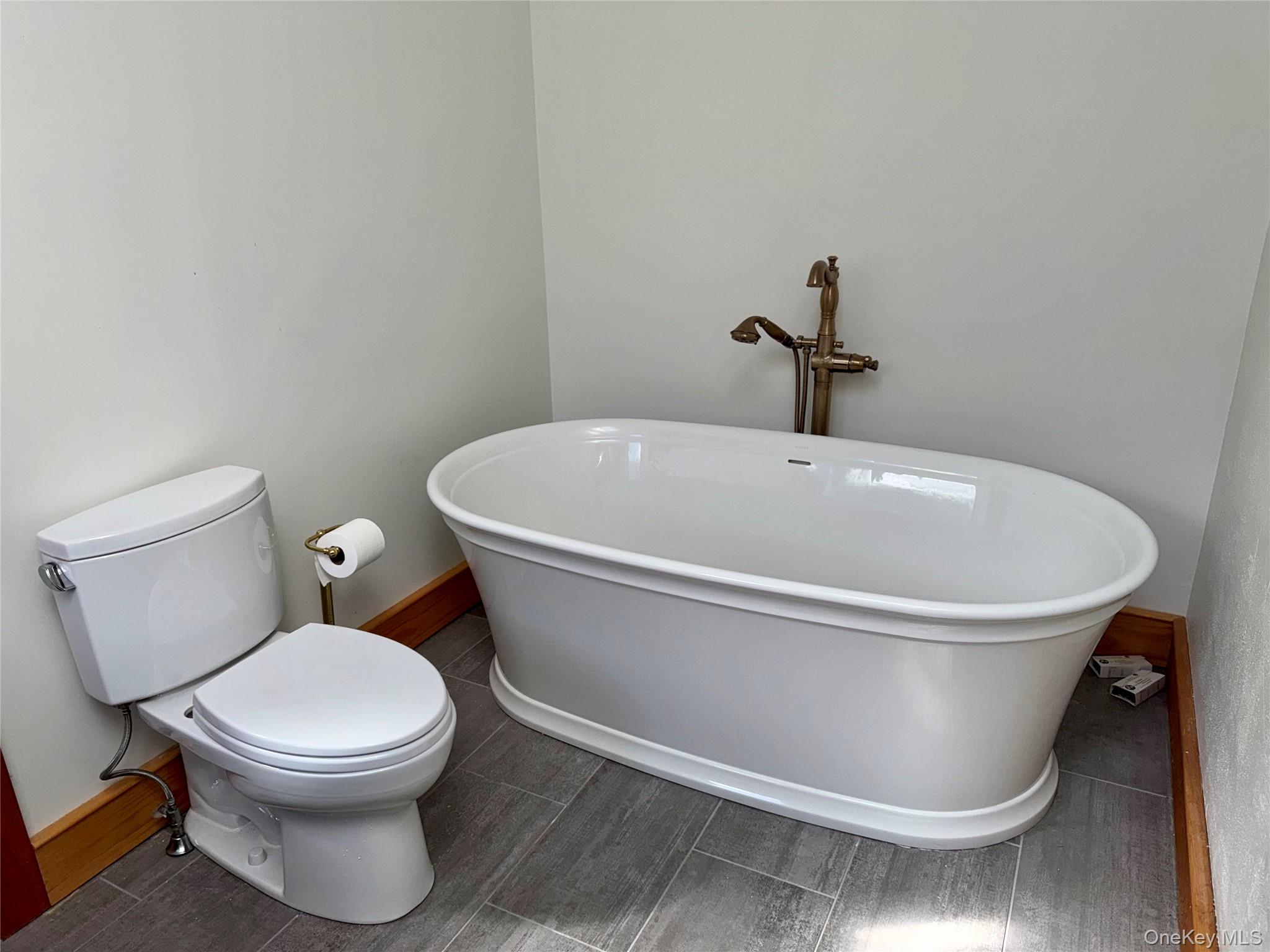 22 Knight Road Clinton Corners, NY 12514 - Photo 29 of 34 Primary Bathroom Soaking Tub and Slate Floors