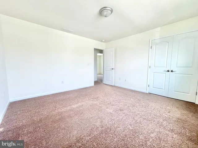 an empty room with an entryway