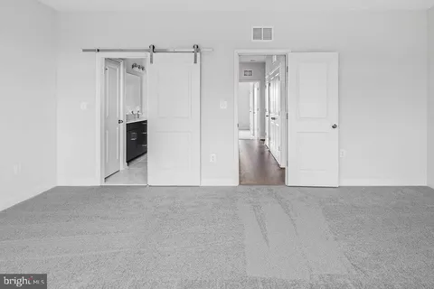 a view of a closet with cabinet