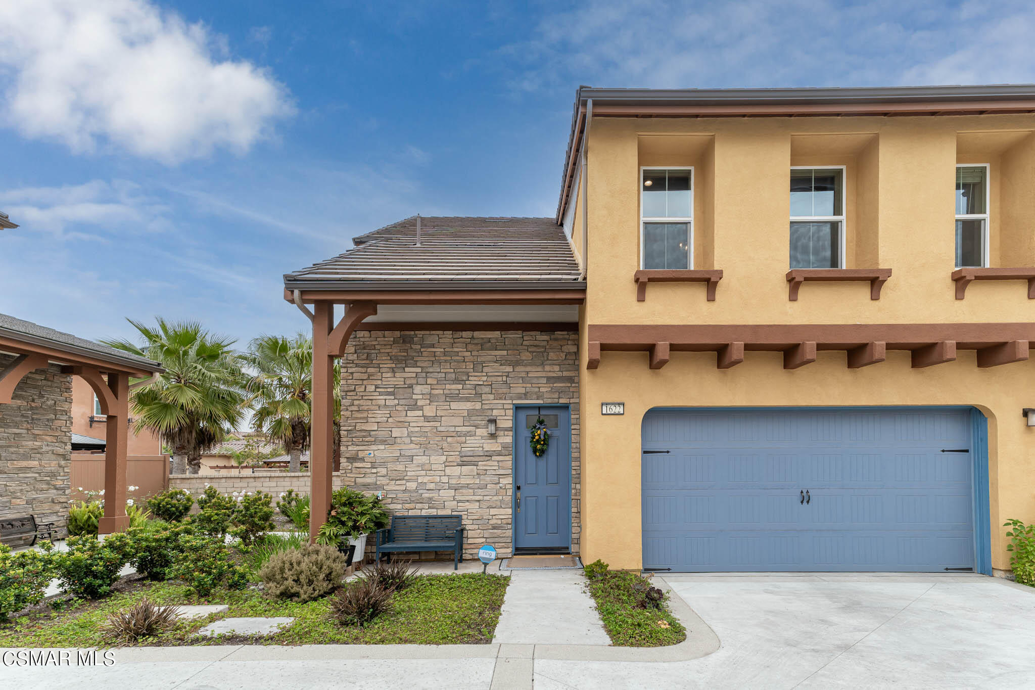 1622 Range Road Oxnard, CA 93036 - Photo 14 of 50 a front view of a house with garden