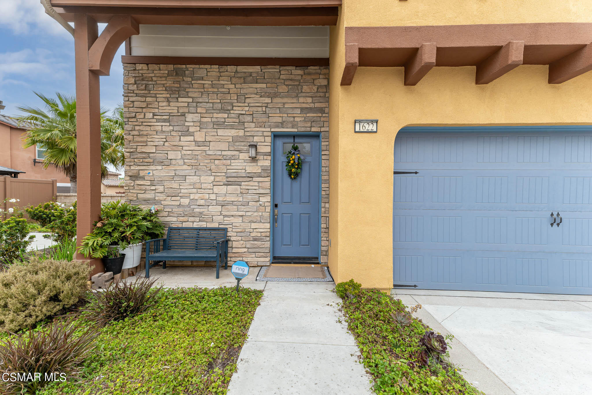 1622 Range Road Oxnard, CA 93036 - Photo 15 of 50 a front view of a house with a garden