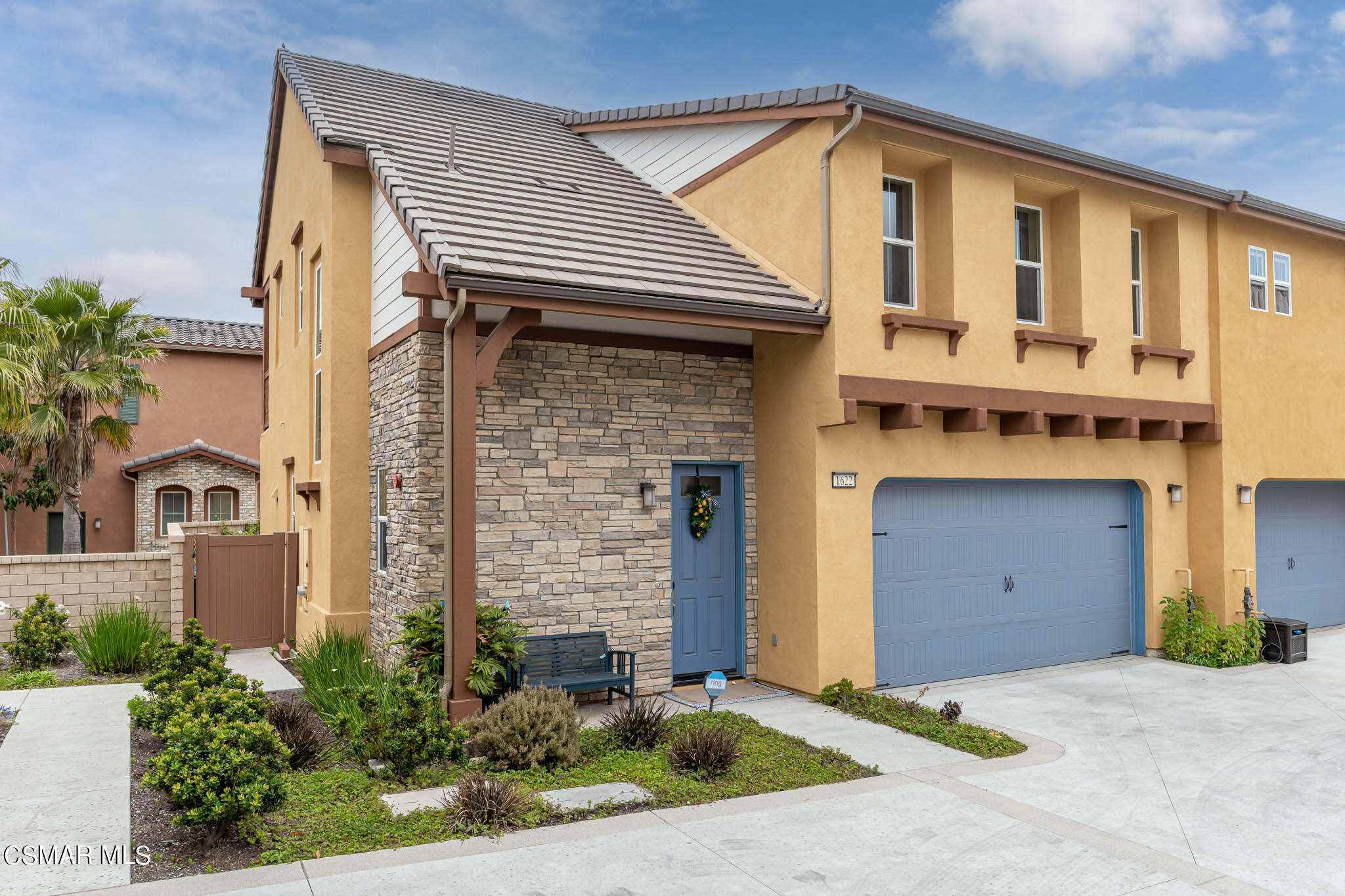 1622 Range Road Oxnard, CA 93036 - Photo 16 of 50 a front view of a house with a garden