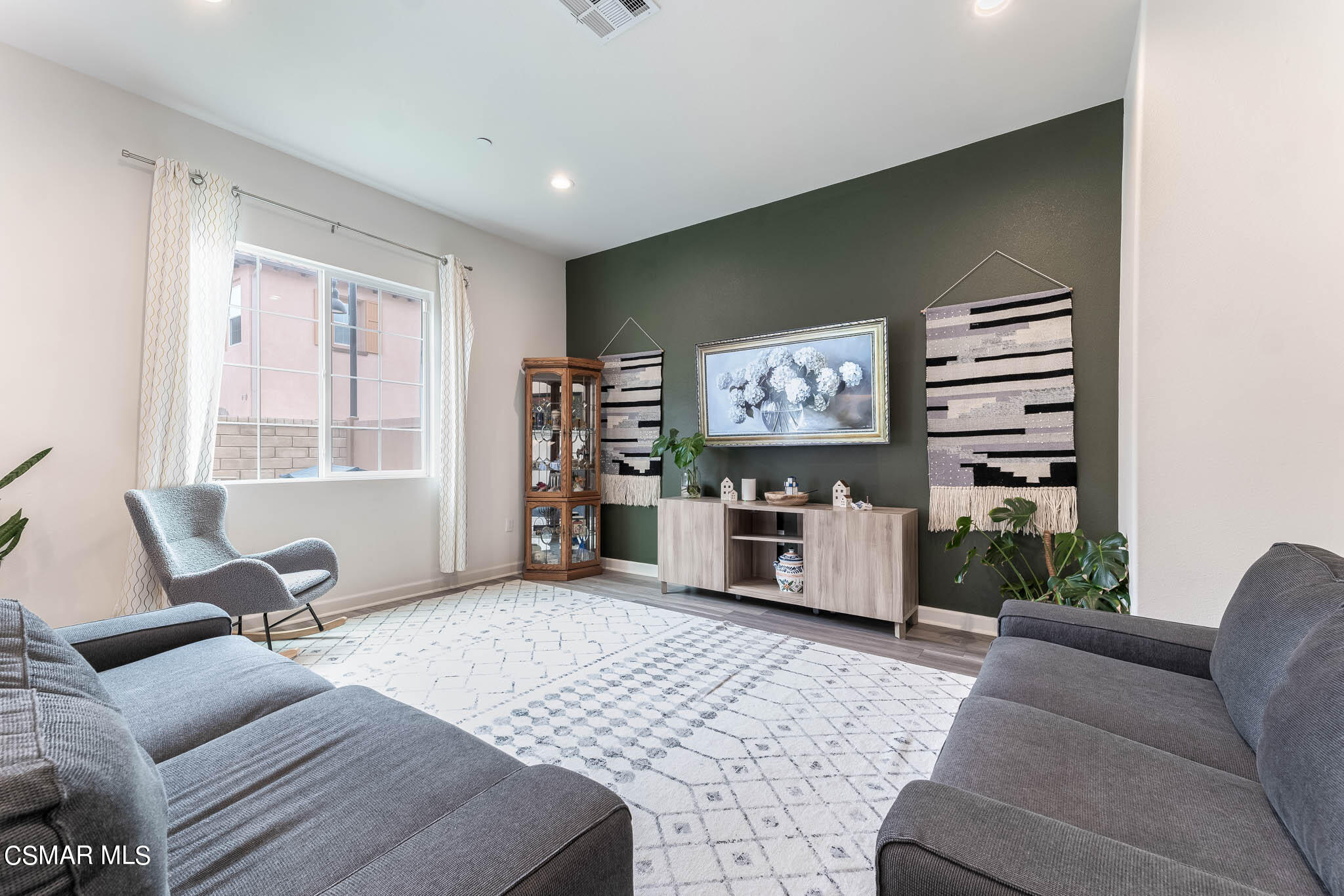 1622 Range Road Oxnard, CA 93036 - Photo 20 of 50 a living room with furniture and a flat screen tv