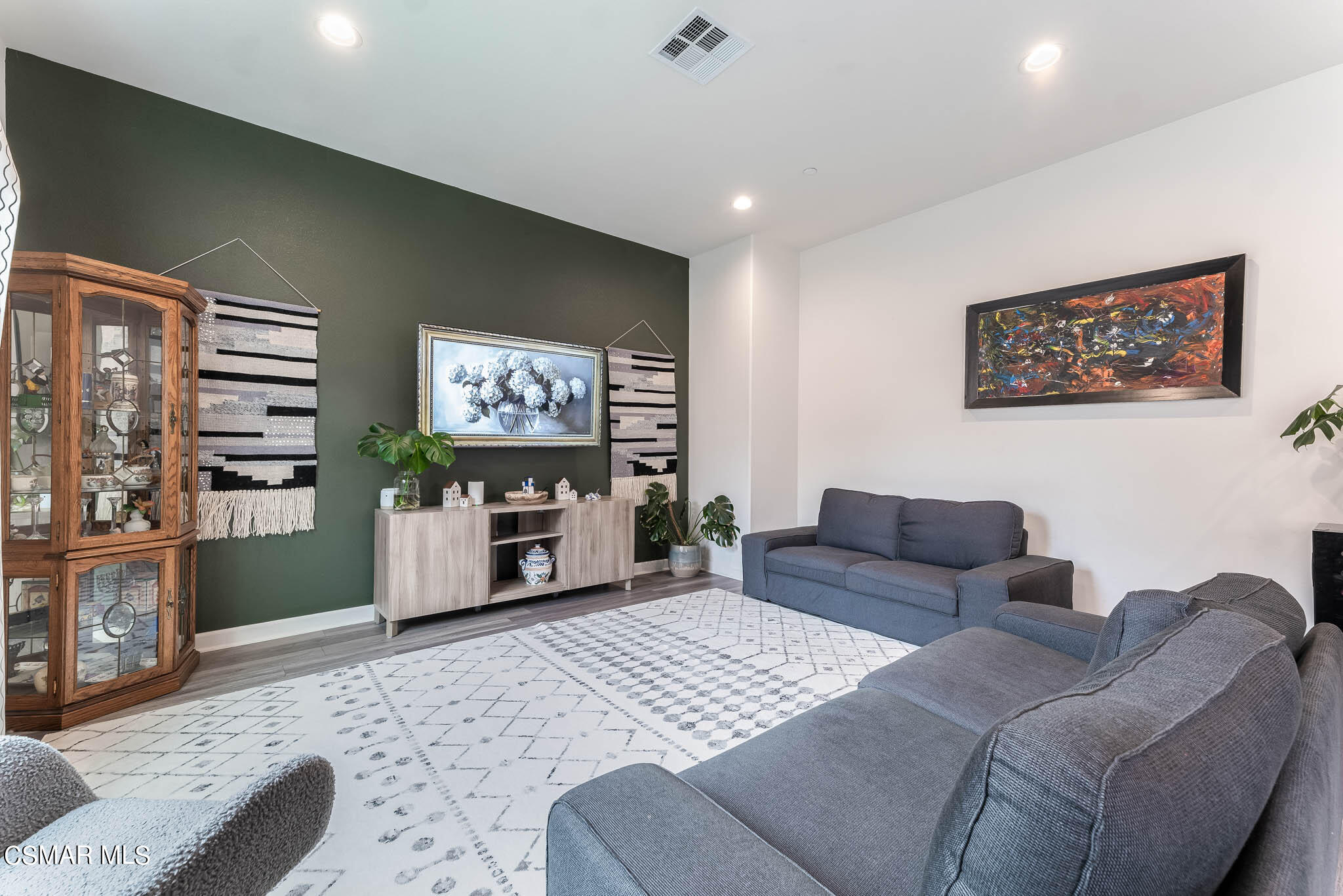 1622 Range Road Oxnard, CA 93036 - Photo 21 of 50 a living room with furniture and a flat screen tv