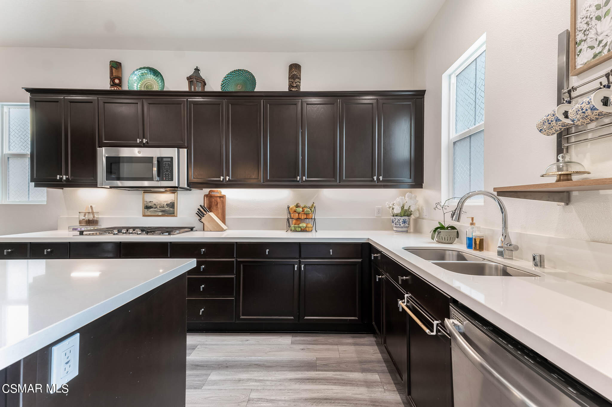 1622 Range Road Oxnard, CA 93036 - Photo 24 of 50 a kitchen with granite countertop a sink dishwasher stove and cabinets