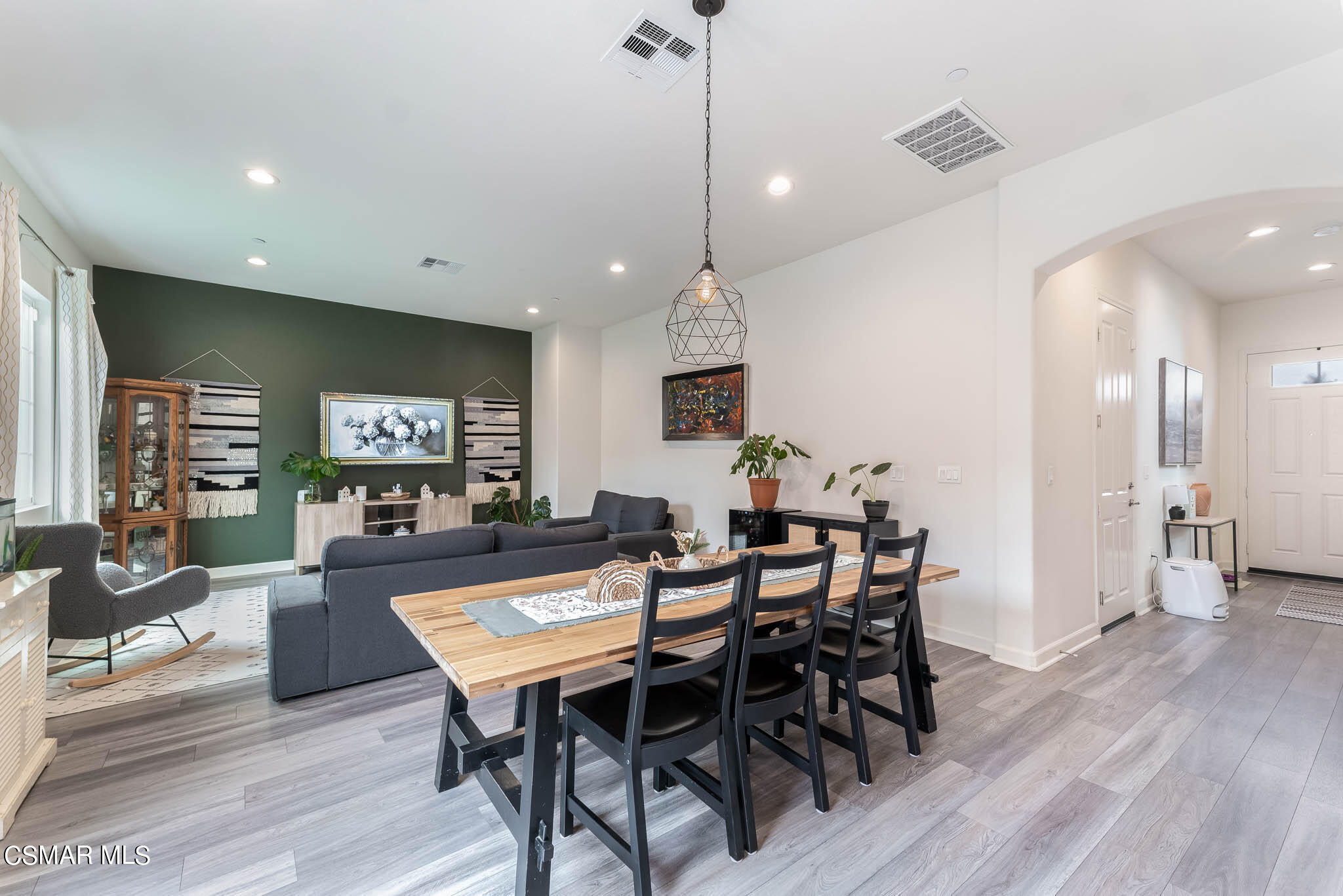 1622 Range Road Oxnard, CA 93036 - Photo 27 of 50 a view of a dining room with furniture and wooden floor