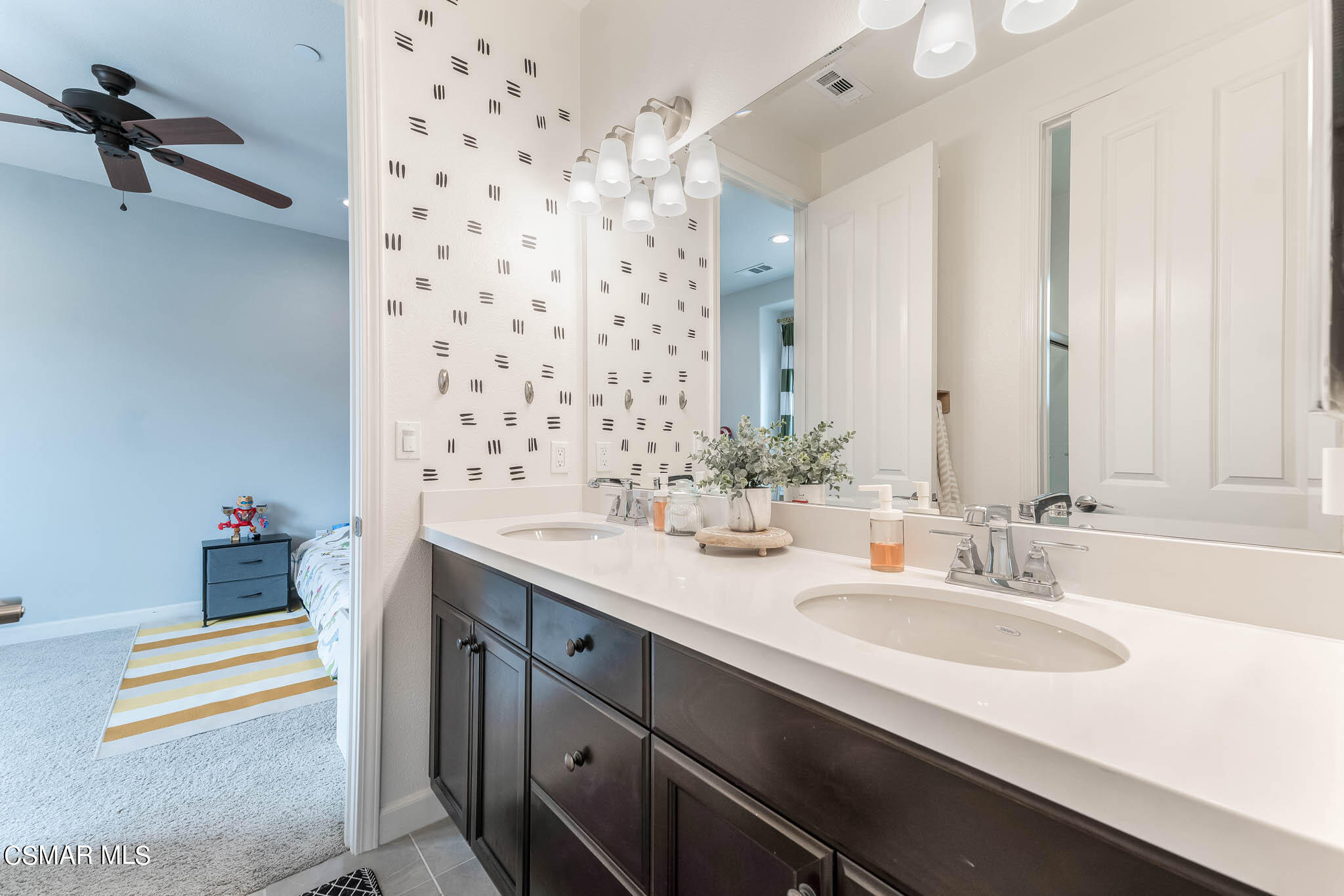 1622 Range Road Oxnard, CA 93036 - Photo 34 of 50 a bathroom with a sink and a mirror