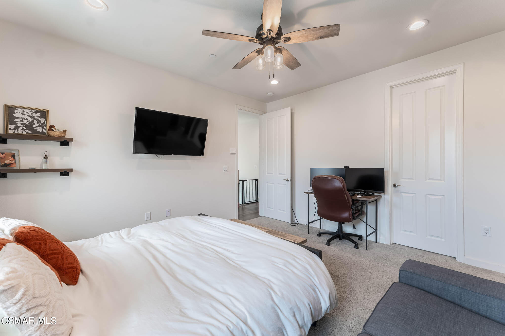 1622 Range Road Oxnard, CA 93036 - Photo 36 of 50 a bedroom with a large bed and a flat screen tv