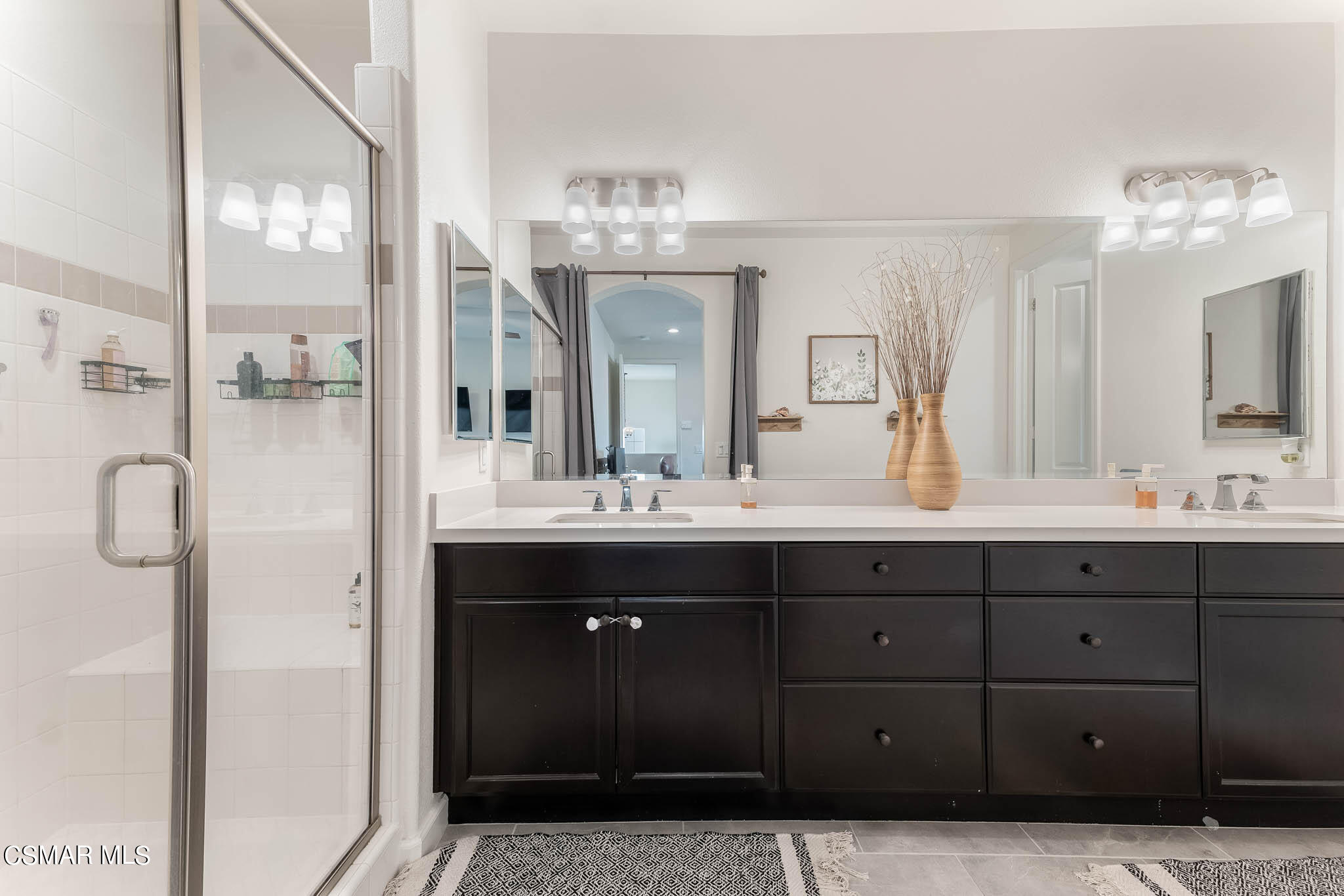1622 Range Road Oxnard, CA 93036 - Photo 38 of 50 a bathroom with a double vanity sink mirror and shower