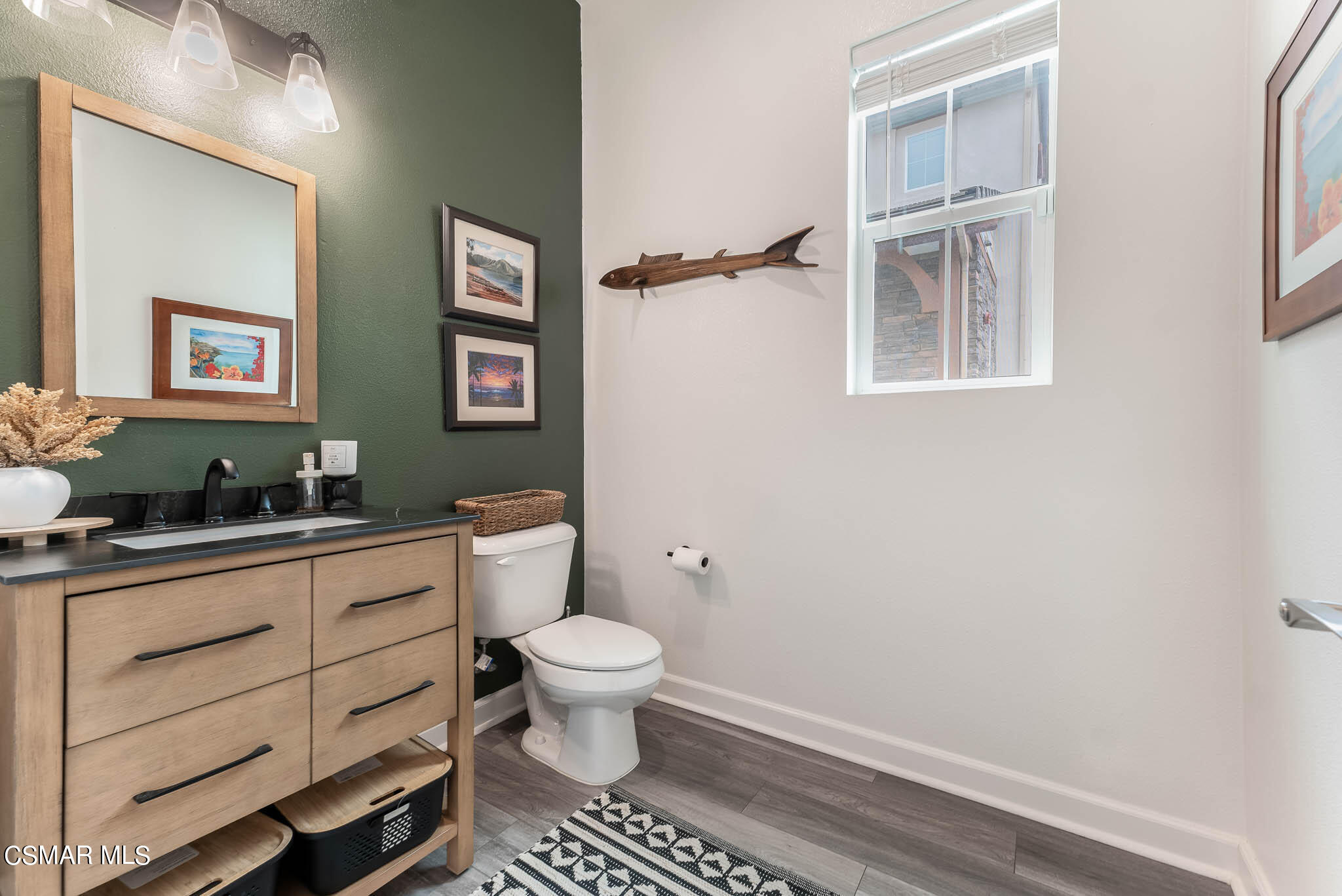 1622 Range Road Oxnard, CA 93036 - Photo 40 of 50 a bathroom with a toilet sink and mirror