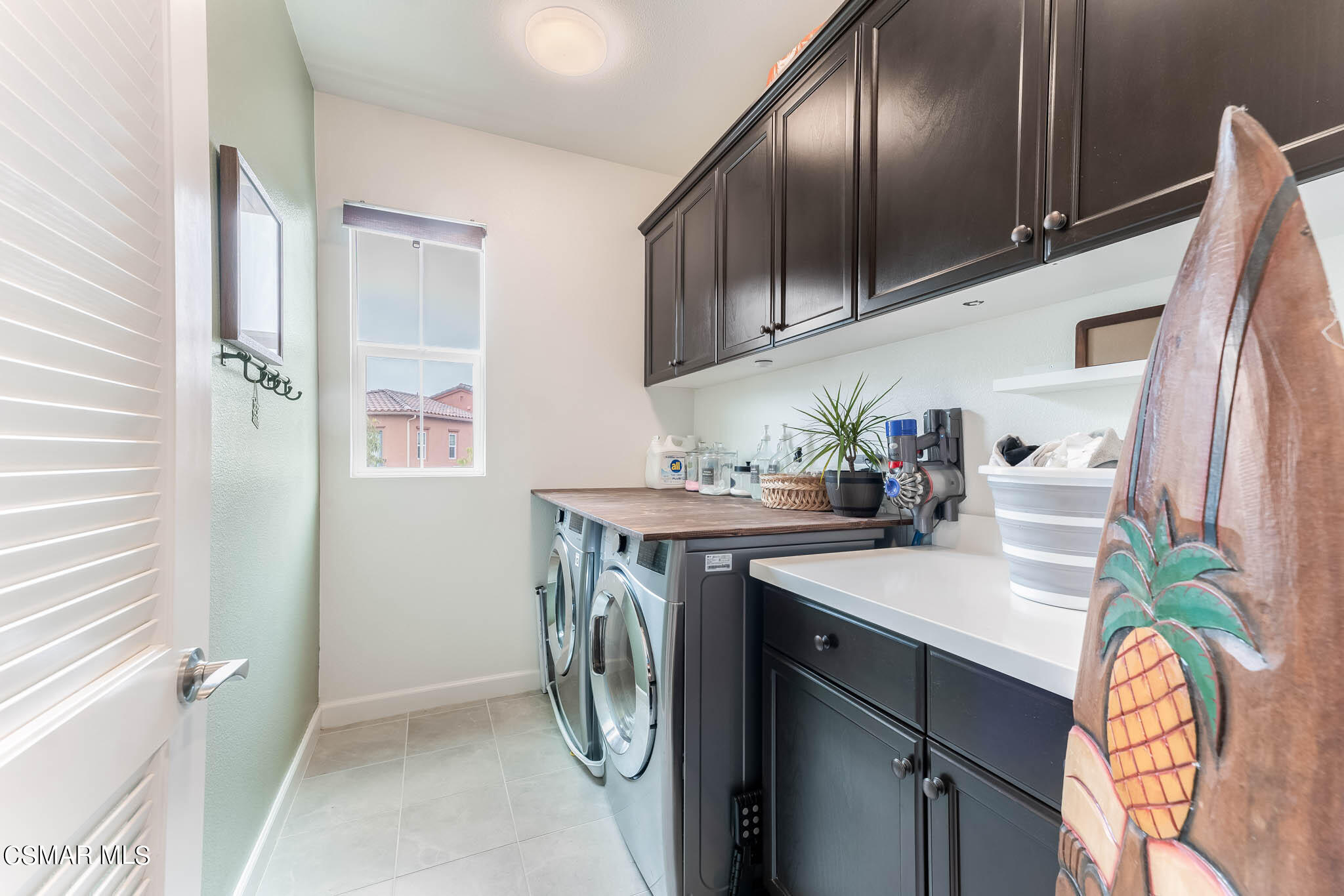 1622 Range Road Oxnard, CA 93036 - Photo 41 of 50 a utility room with a sink a washer and dryer