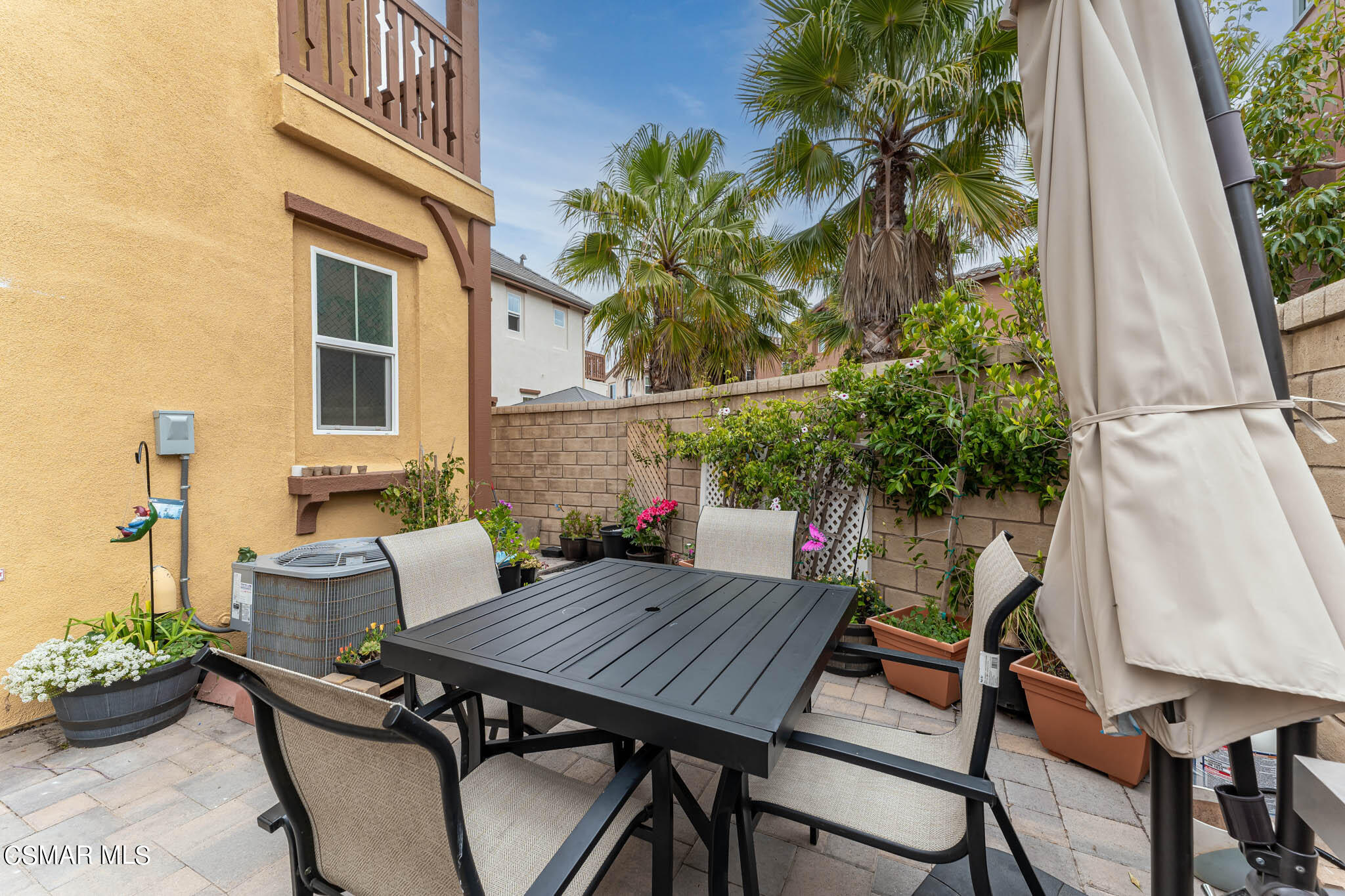 1622 Range Road Oxnard, CA 93036 - Photo 47 of 50 a view of a table and chairs in patio