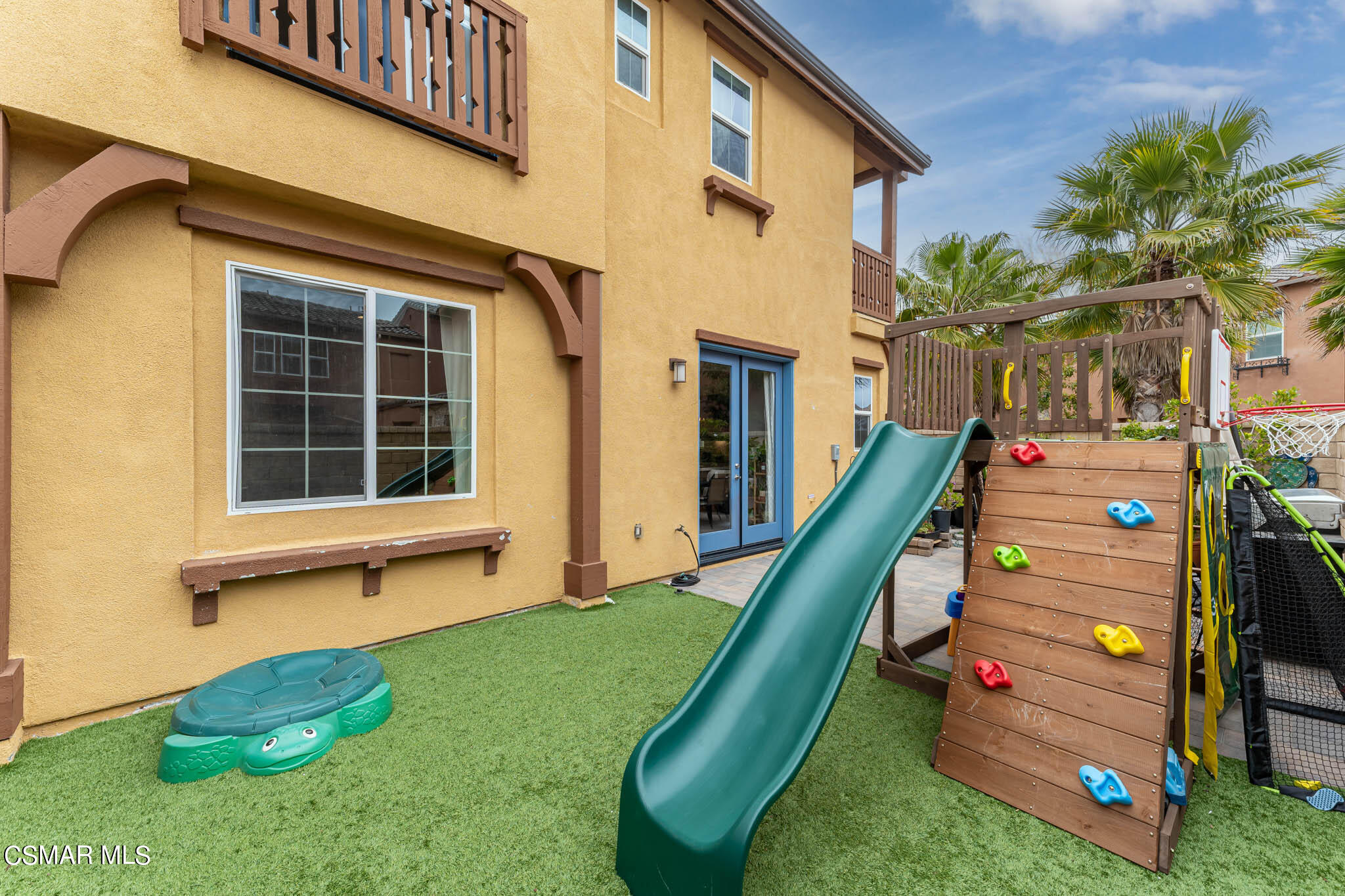 1622 Range Road Oxnard, CA 93036 - Photo 49 of 50 a green field with some trees in front of the house
