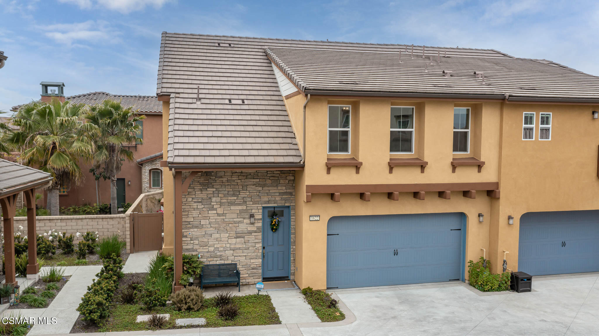 1622 Range Road Oxnard, CA 93036 - Photo 6 of 50 a front view of a house with garden
