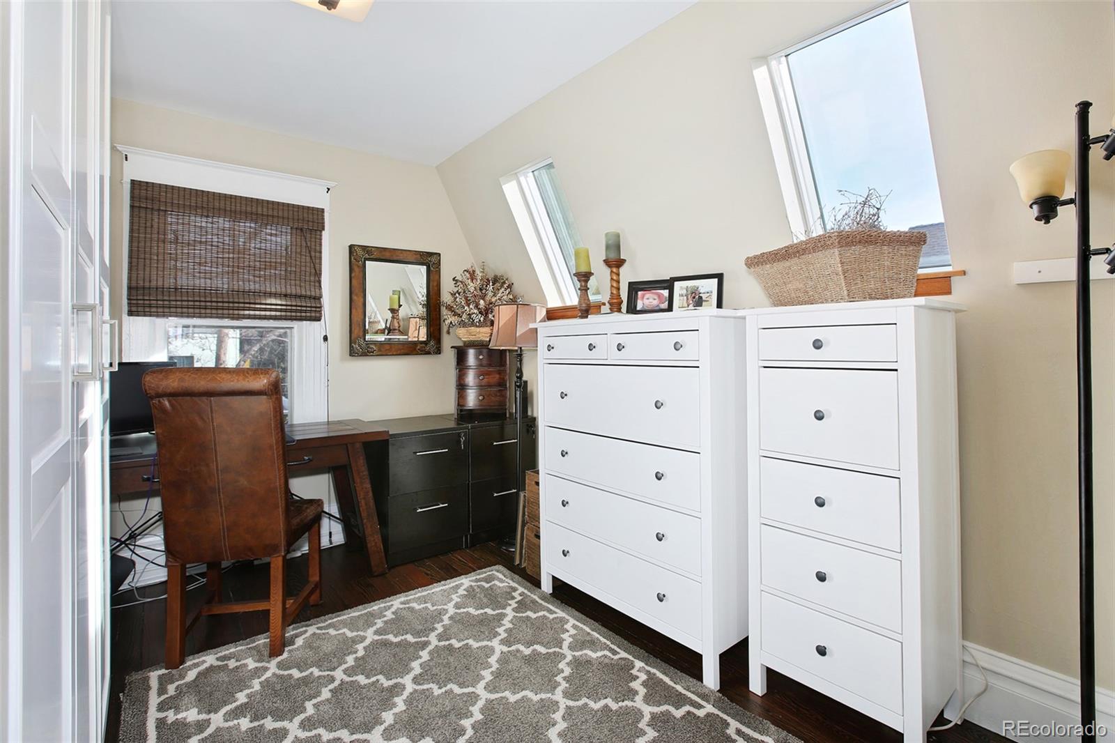 570 Gilpin Street Denver, CO 80218 - Photo 20 of 30 a room with a cabinets and a dresser