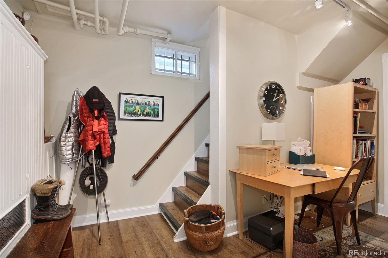 570 Gilpin Street Denver, CO 80218 - Photo 22 of 30 a view of a dining room with furniture and wooden floor